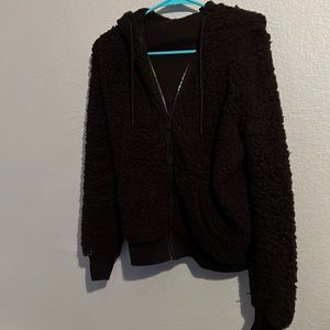 Black fuzzy zip up jacket with hood